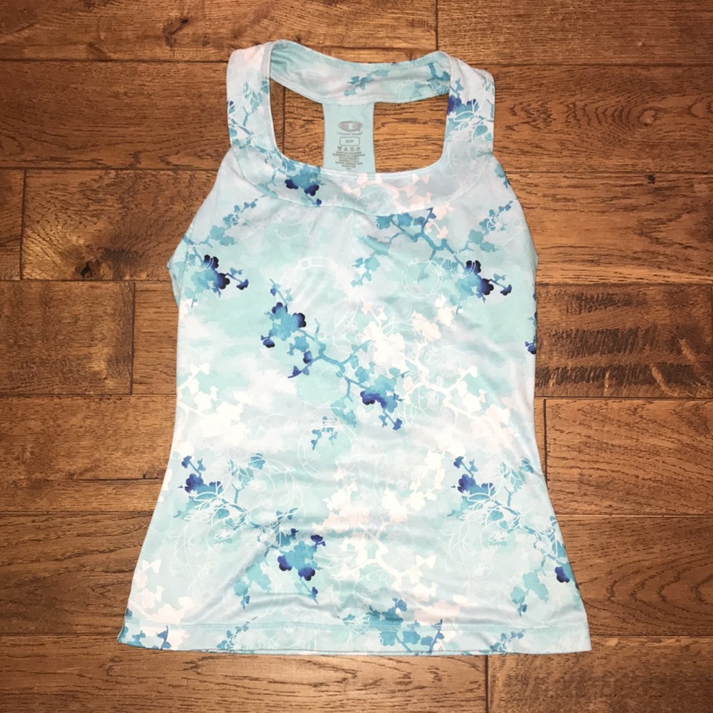 Shades of teal and white workout top with built in bra